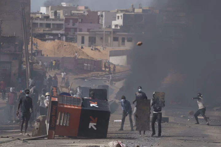 Clashes in Senegal kill at least 9; government bans social media platforms and closes university