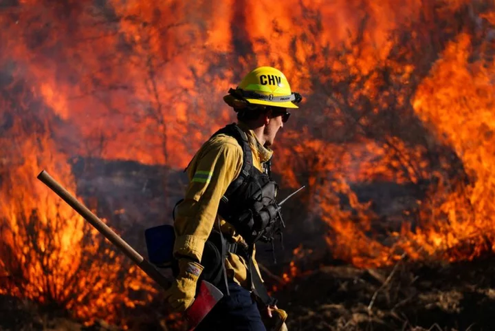 California wildfire, fueled by desert winds, forces evacuations