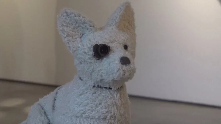 An AI robot dog has become an art critic - and poops out his reviews